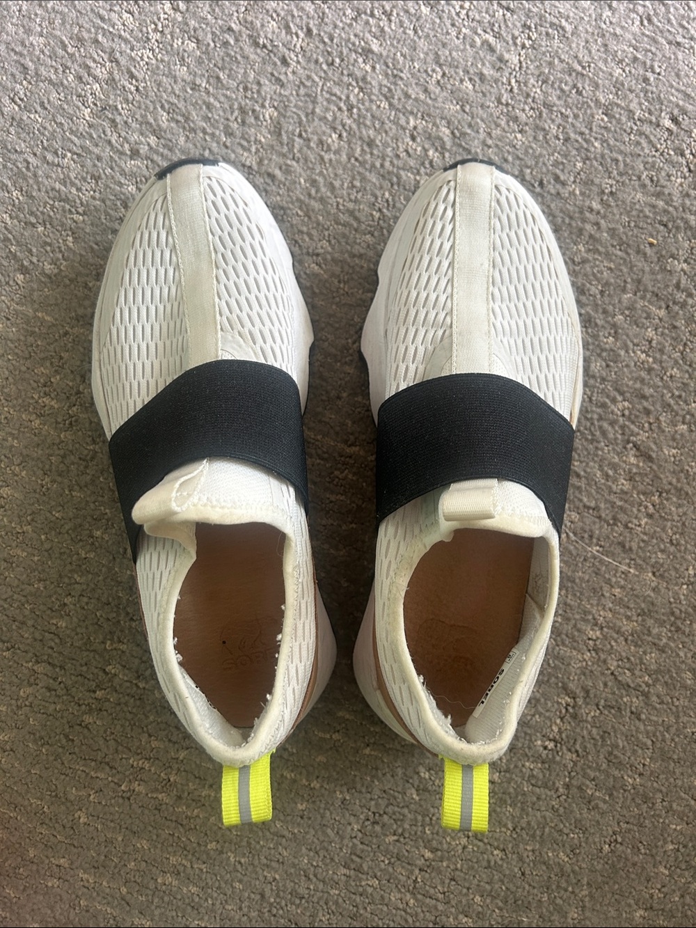 Sorel White Slip-On Sneakers with Black Strap and Yellow Pull Tab